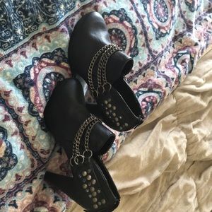 Bke black heeled bootie with metal detail